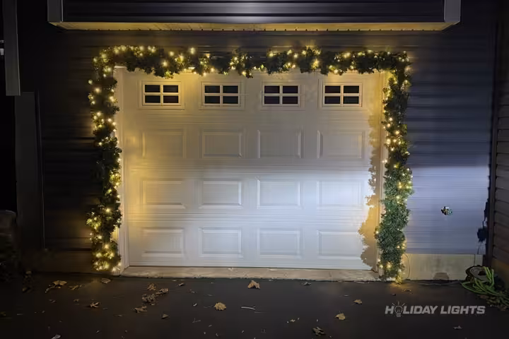 Garage door Christmas garland decoration with LED lights for residential homes Garage door Christmas garland decoration with LED lights for residential homes