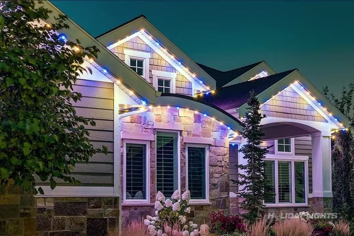 App-controlled permanent LED lighting on a Connecticut home facade
