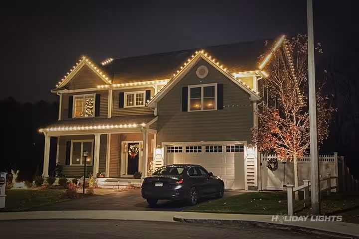 Professional roofline Christmas decoration with C9 LED lights for residential properties Professional roofline Christmas decoration with C9 LED lights for residential properties