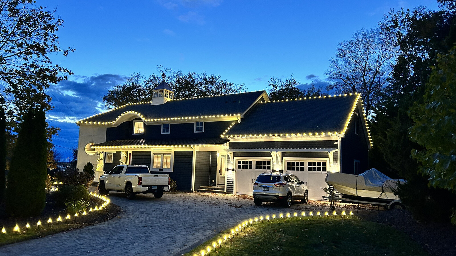 Christmas light installation in Killingworth